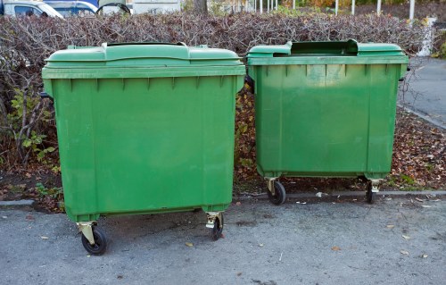 Team members sorting recyclable materials during waste clearance