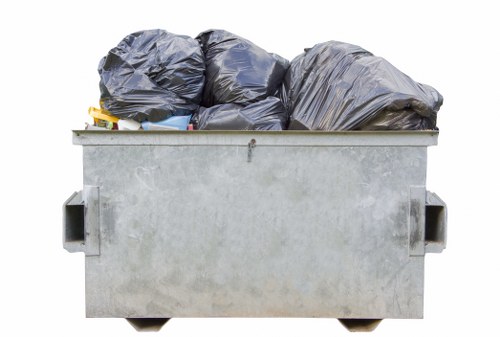 Garbage trucks handling different types of waste in Sydenham