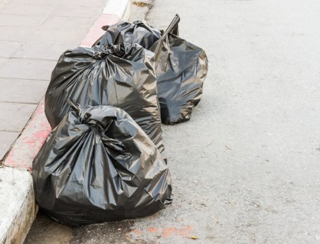 Eco-friendly disposal practices in flat clearance Sydenham